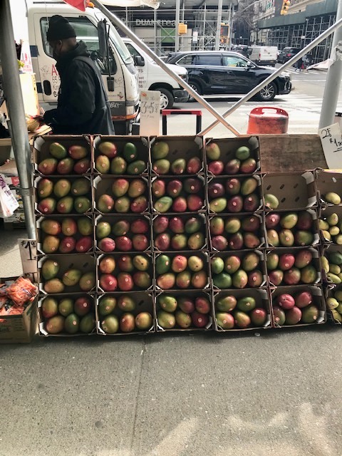 A sign of spring: mangoes at a Broadway fruit vendor, 2 for $1